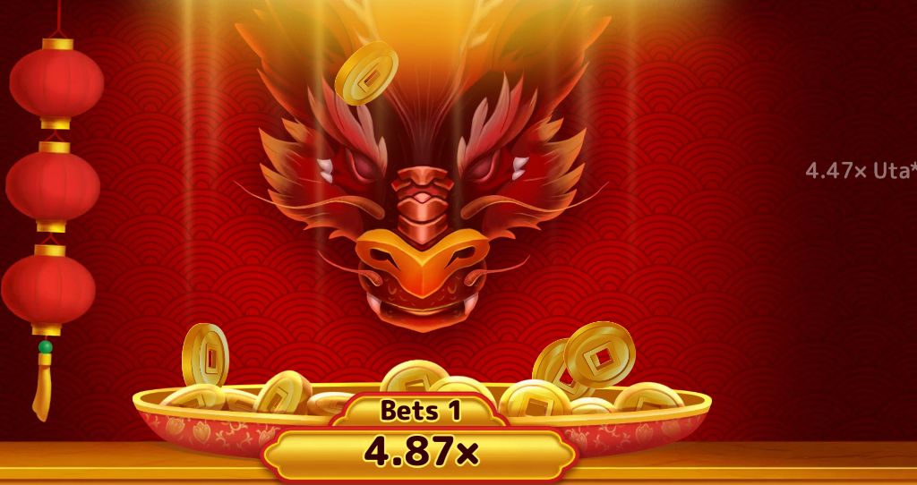 Live round showing a 4.87x multiplier on the golden bet tray below the dragon